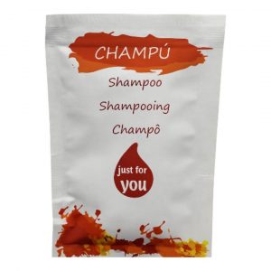 Sobres de champú monodosis Hache 10 ml. Formato práctico e higiénico para hoteles y alojamientos. Presentación profesional en caja de 1000 unidades